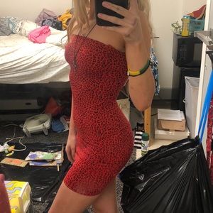 Red cheetah body con dress